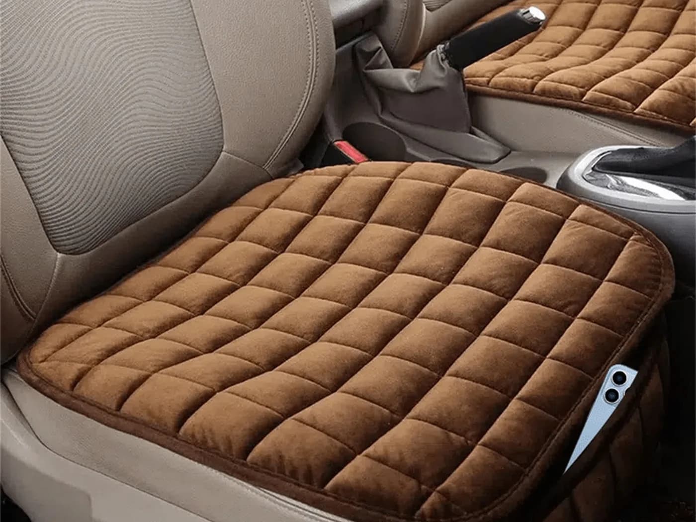 Quilted brown car seat cushions for dropshipping Car accessories dropshipping supplier quilted brown seat cushions fitted in a vehicle.